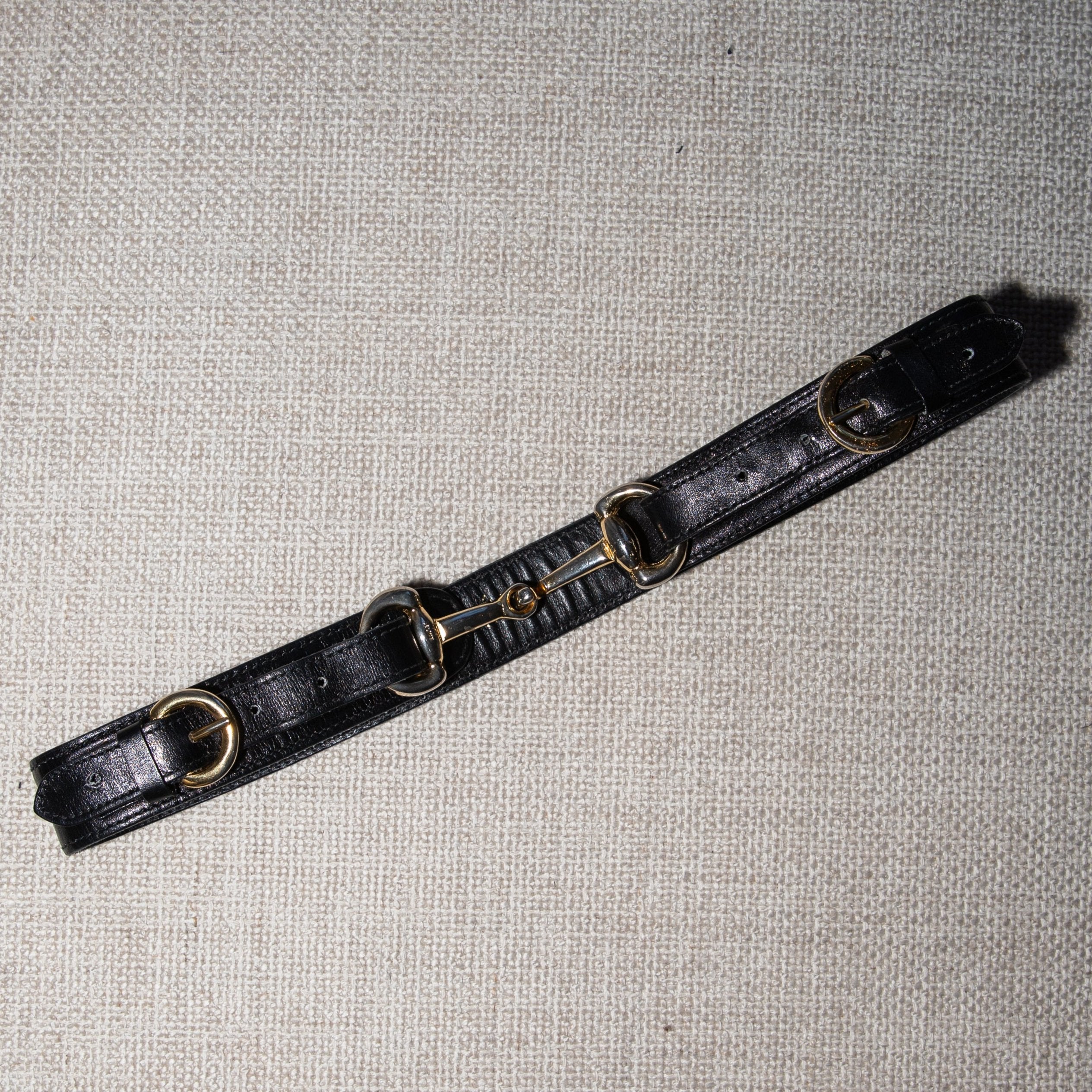 old celine black leather belt with horsebit details