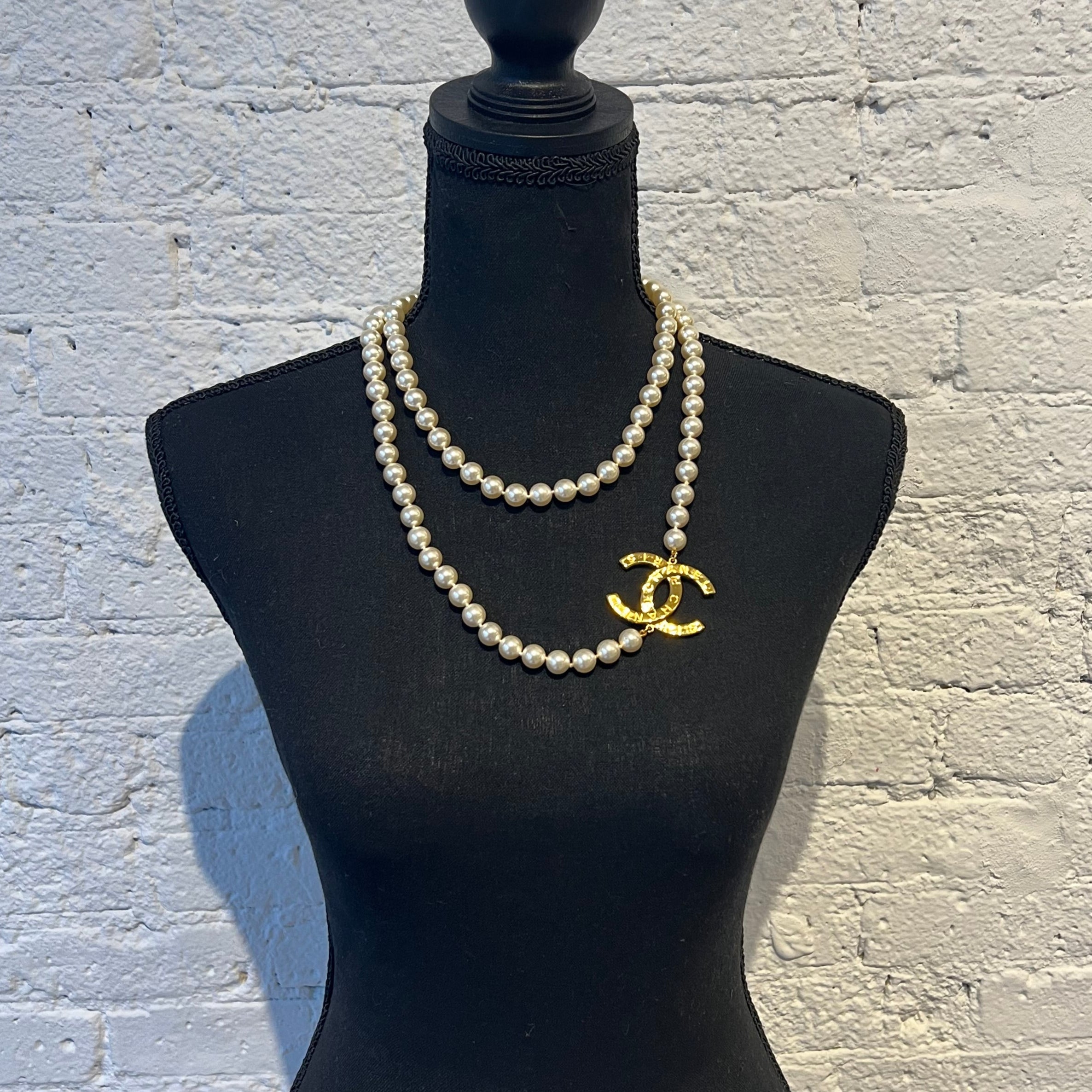 Chanel Authentic faux pearls with gold CC mark charm oversized