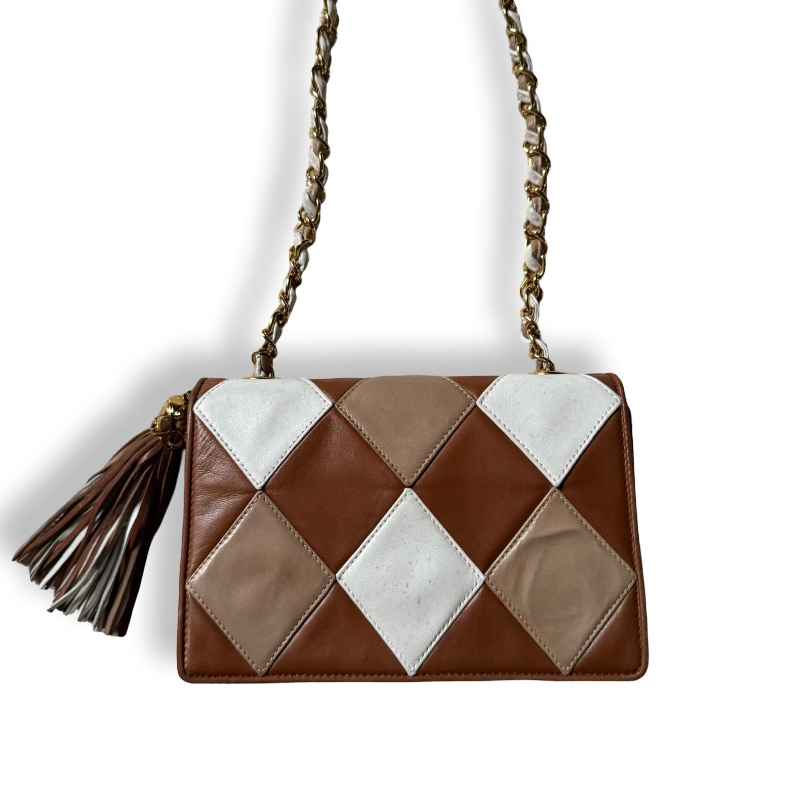 Chanel Vintage 90s authentic front flap shoulder bag cognac brown and white diamond pattern with tassel