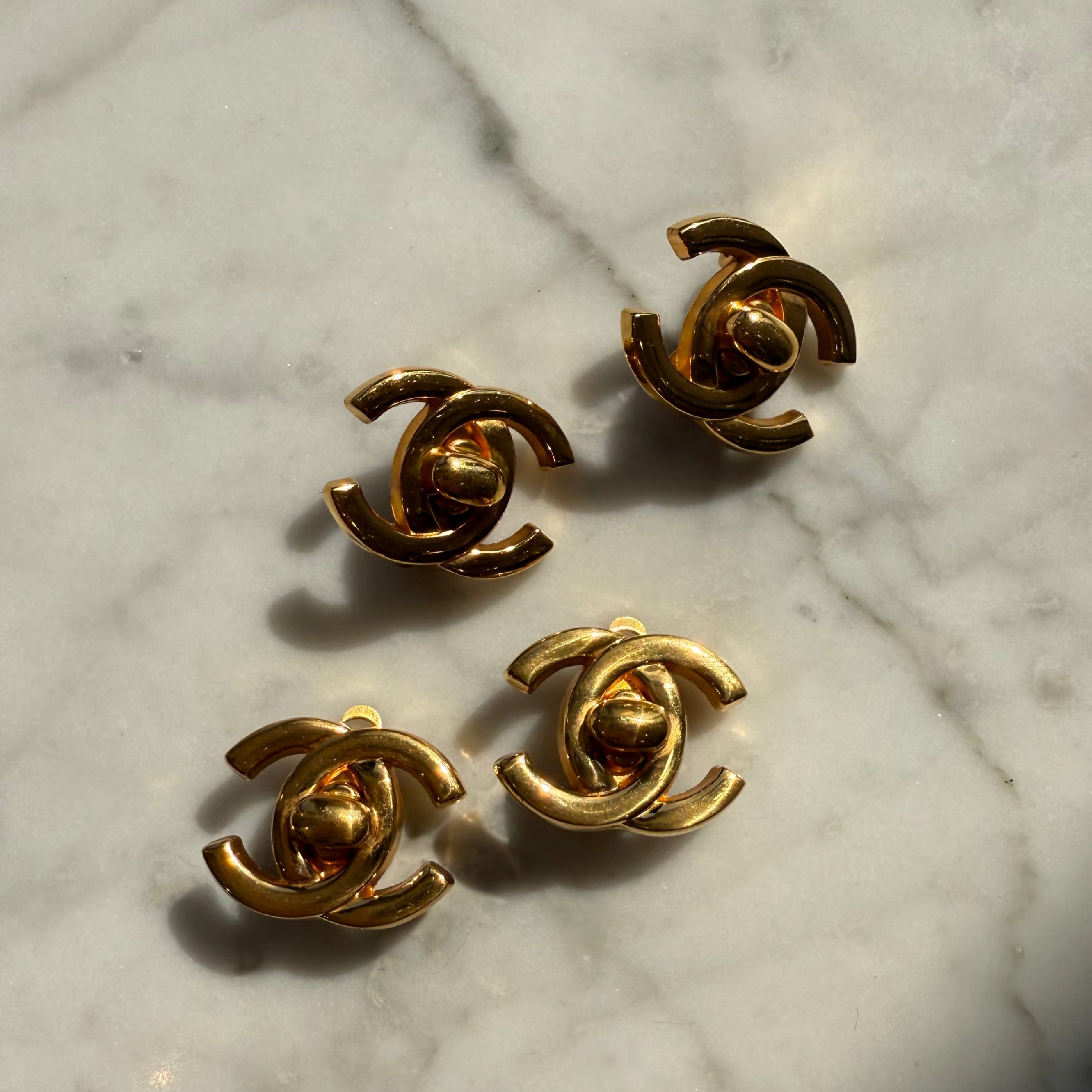 Vintage Chanel authentic cc logo earrings turn lock design 90s