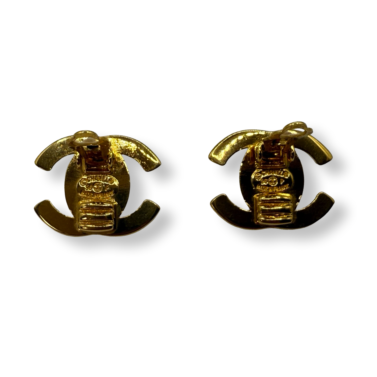 Gold vintage authentic 1990s Chanel turn lock earrings cc logo