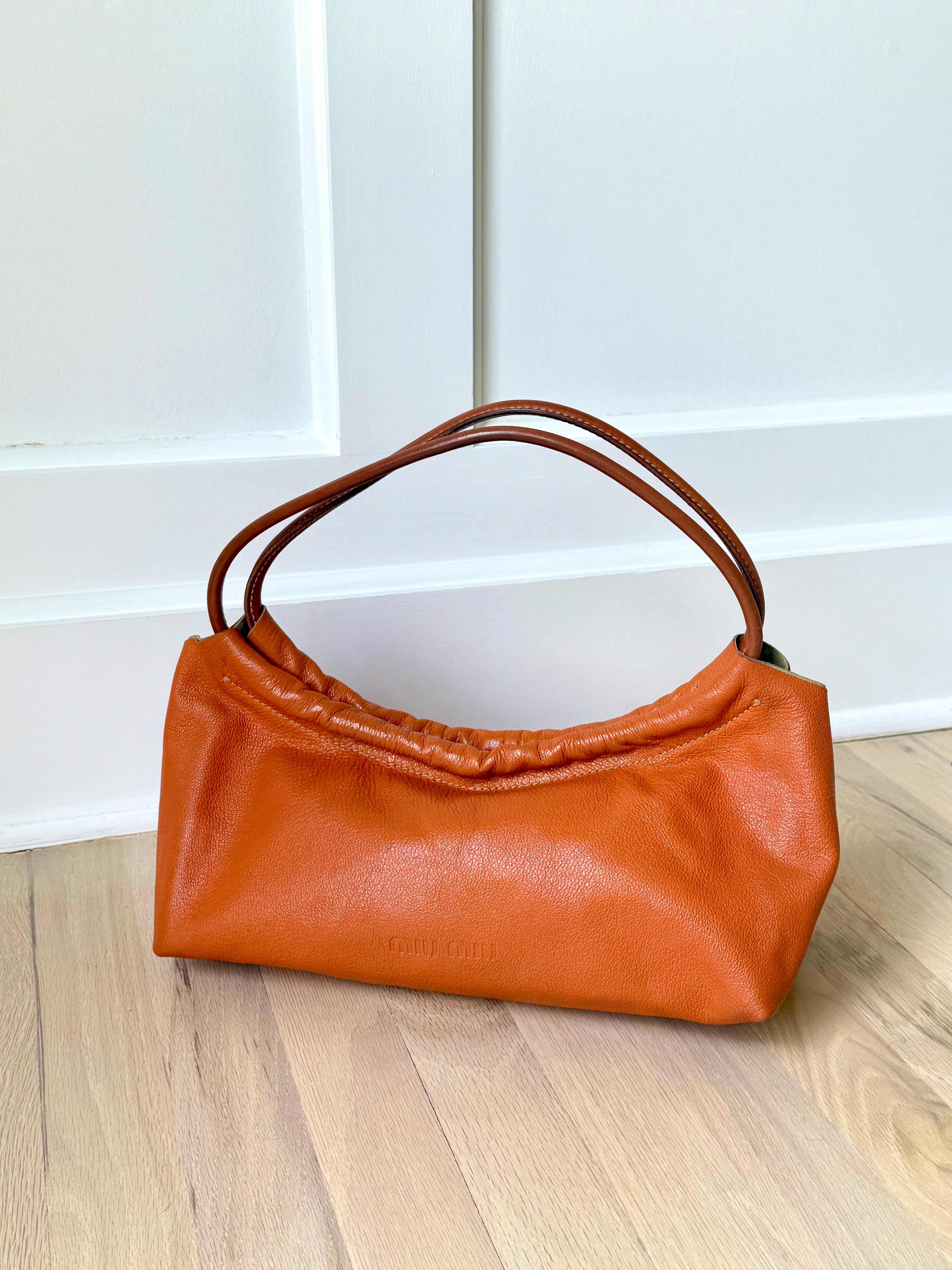 Miu Miu Orange Dumpling Bag