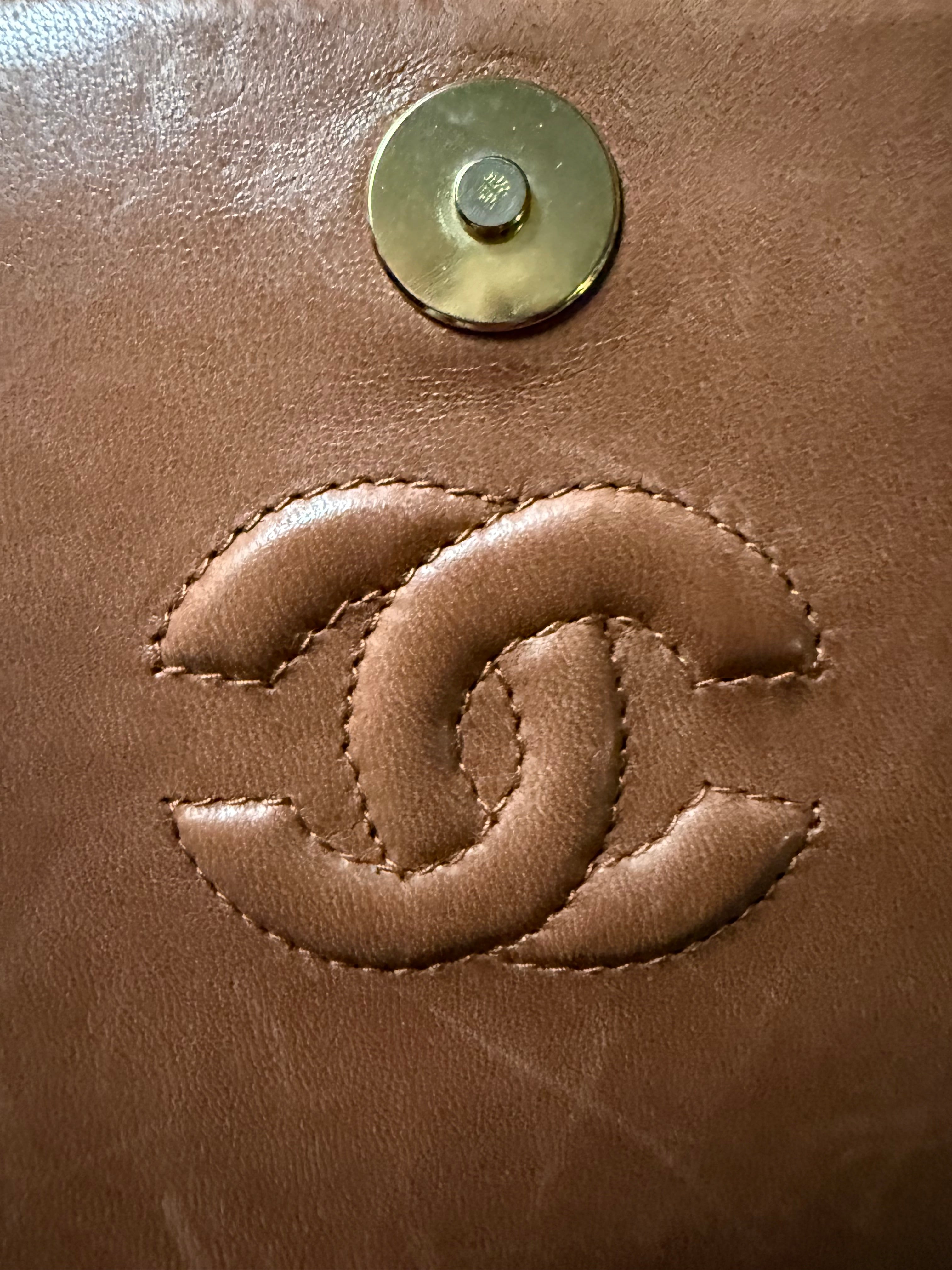 Chanel Vintage 90s authentic front flap shoulder bag cognac brown and white diamond pattern with tassel