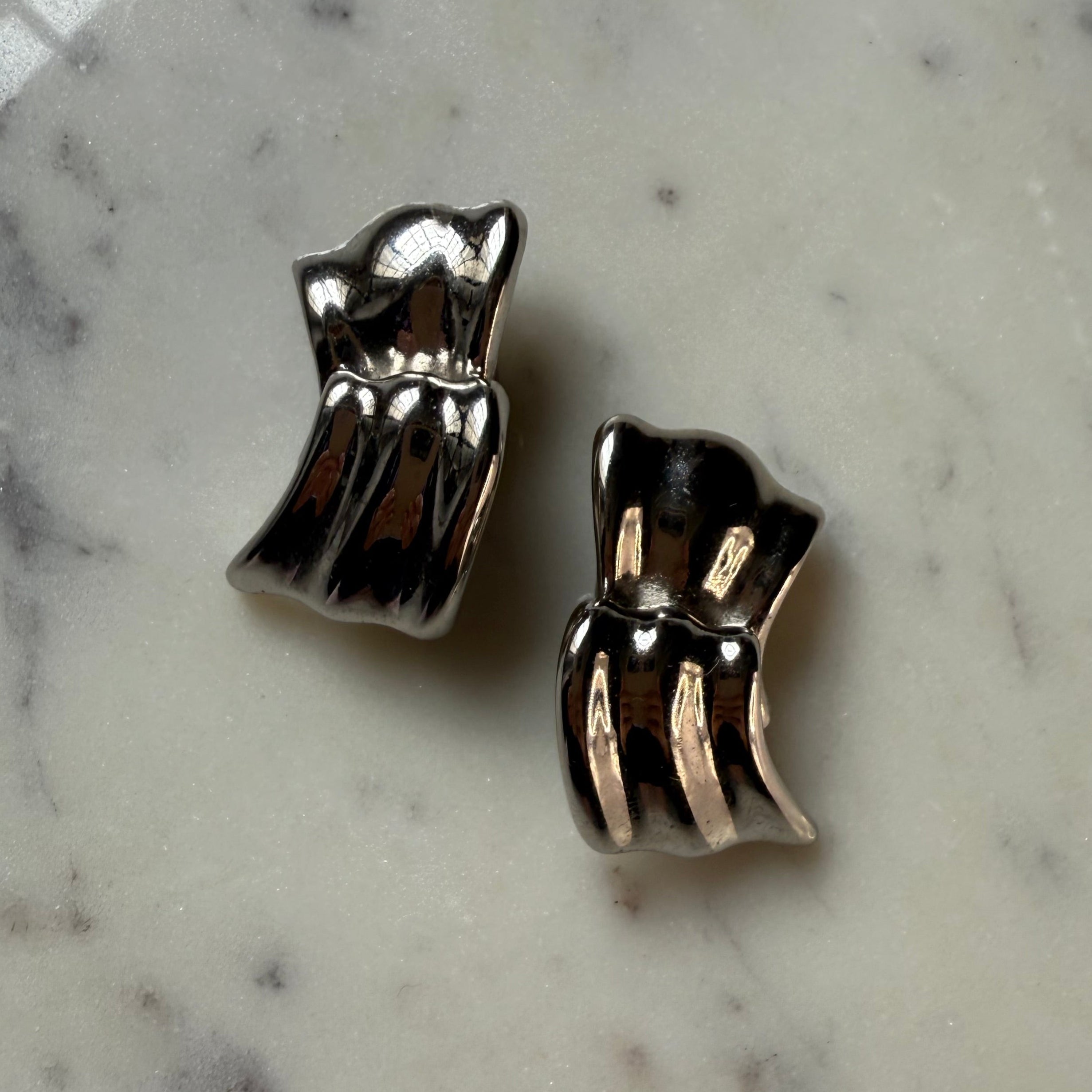 Vintage authentic Givenchy Silver large ribbon wave style earrings